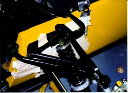 Upper wishbone ARB and headlamp bracket